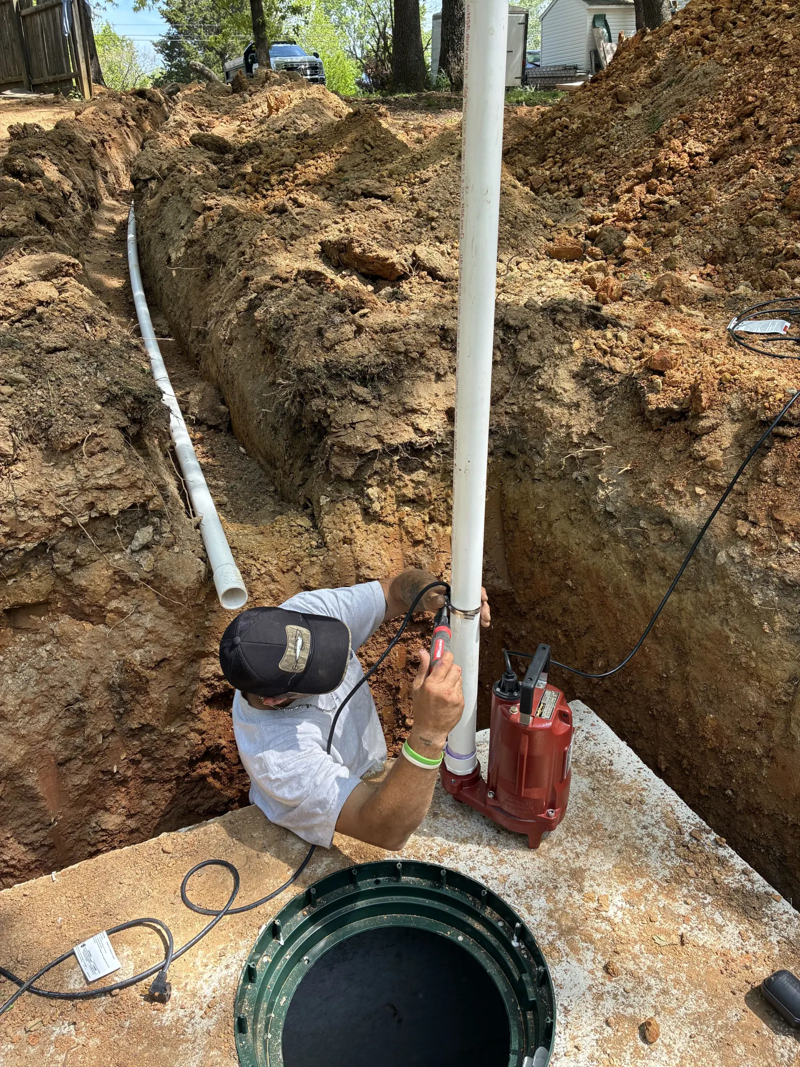 Effluent pump being set into a septic tank riser